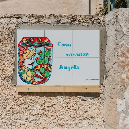 Angela *